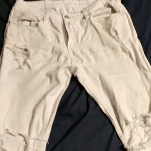 White ripped jeans